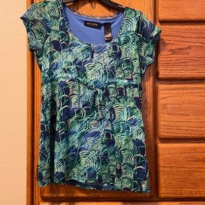 Axcess woman’s short sleeve blouse.